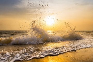 the sun disappears into the water